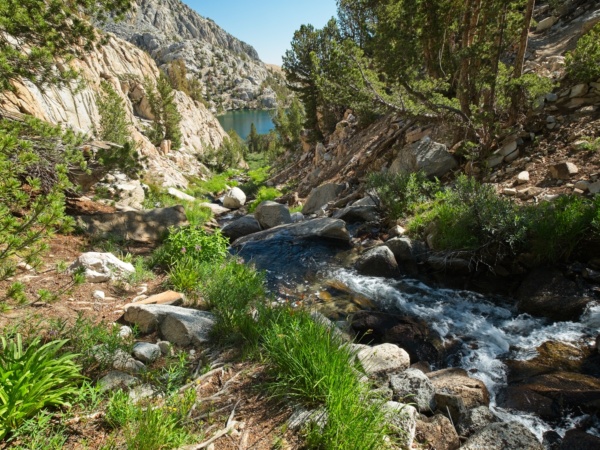 Water tumbles down a small canyon toward Lower Lamarck Lake lamarck lakes
