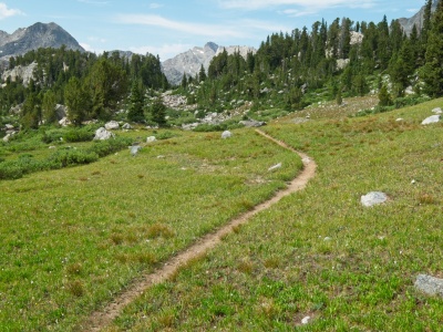 The trail continues winding uphill wind river range