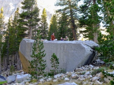 Kathy, Daryn, and I eating dinner on a massive boulder. Photo credit: Craig tamarack lake