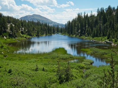We stop in the shade beside this lake to eat lunch wind river range lake