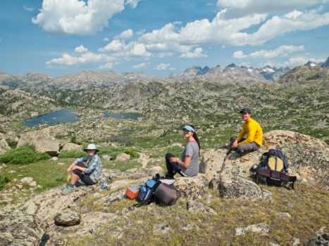 Diane, Katherine, and Josh resting at the top of Lester Pass wind river range lester pass