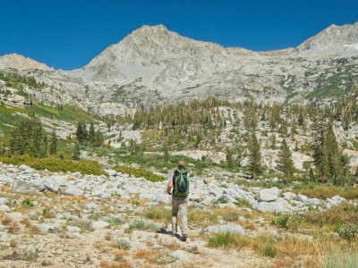 Craig strolls up the valley toward Tamarack Lake lion rock