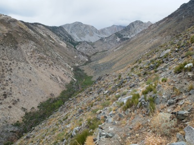 The dark skies provide shade and cool weather during the hike through this otherwise shade-less canyon red lake trail