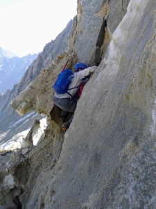 I scramble up an ice chimney to reach the chute that will lead us to the Sierra Crest. Photo credit: Craig mountaineering