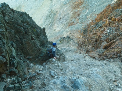 Craig descends the steep chute near the foot of Middle Palisade mountaineering