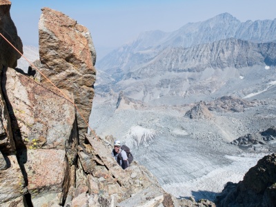 Craig finishes the climb with the Norman Clyde Glacier hundreds of feet below palisade crest