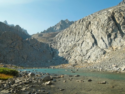 A turquoise tarn just below the moraines palisades