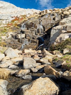 Water cascades down the rocks below Sky Blue Lake miter basin