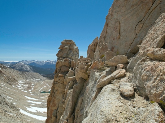 A small ledge leads to a class 3-4 downclimb and the other side of the rib mountain climbing