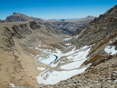 A few icy lakes below - Erin Lake is at the far end of the canyon alpine lakes