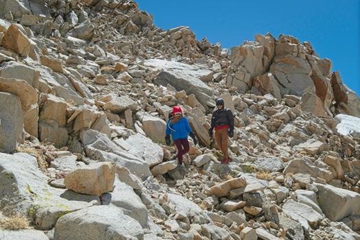 Sarah and Peter descend from Mount Pickering mountain climbing