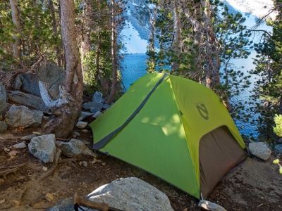 I pitch my tent in a little clearing above the lake big mcgee lake