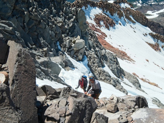 Andrew and Craig transition from snow climbing to a pitch of easy rock climbing mount jefferson mountaineering