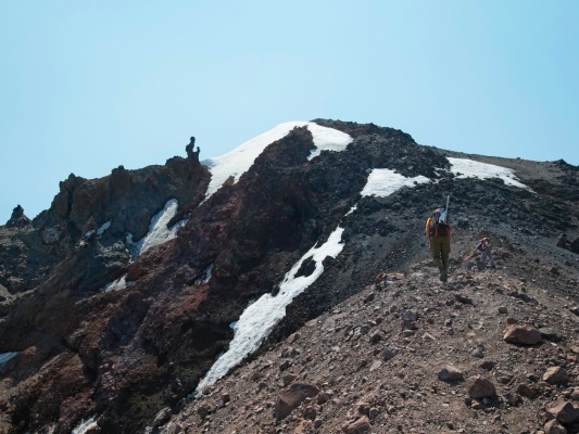 Craig and Linda walk up the ridge trail toward the summit of Middle Sister middle sister
