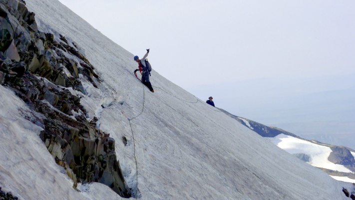Craig snaps a photo of me and Linda crossing the snow traverse north sister