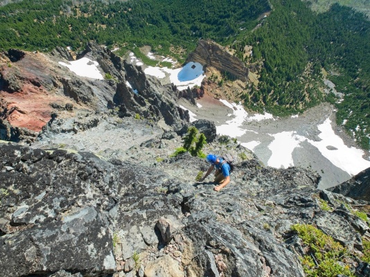 Craig scrambles up an exposed class 4 wall mount washington