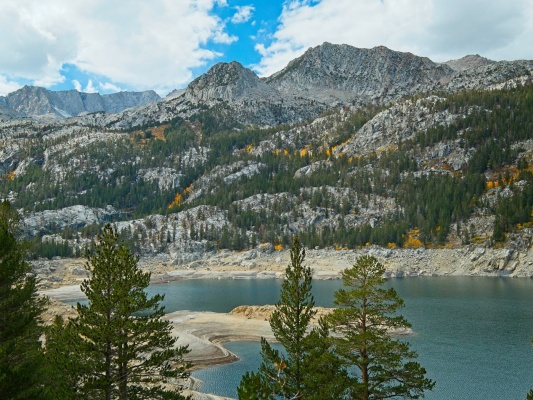 Blazing swaths of aspens crisscross the mountainside south lake