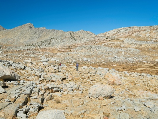 We soon reach easier terrain with lots of grass and flat walking cross country hiking