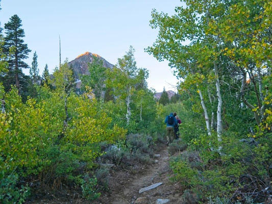 After walking in the dark for a while, I'm stoked to see some sunlight on the peaks! green lake trail