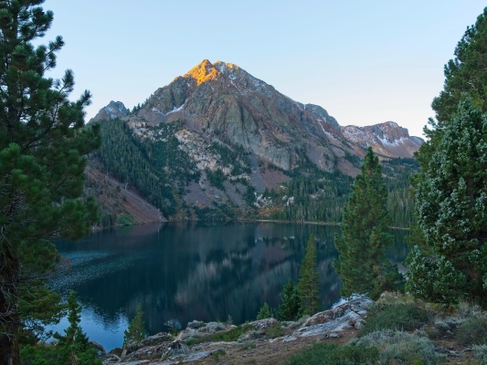Gabbro Peak catches the morning light above Green Lake gabbro peak
