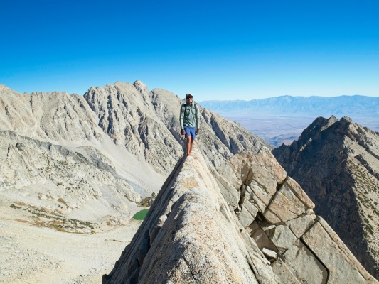 John poses on the knife-edge ridge mount humphreys
