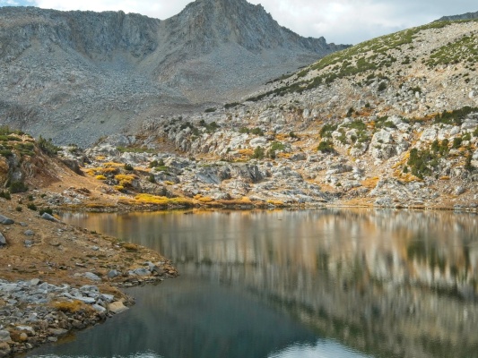 I can't resist photographing the splashes of golden willows reflected in this alpine lake autumn colors