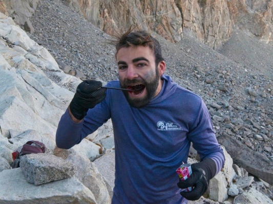 Alex tries the first bite of raspberry jello with poprocks jello