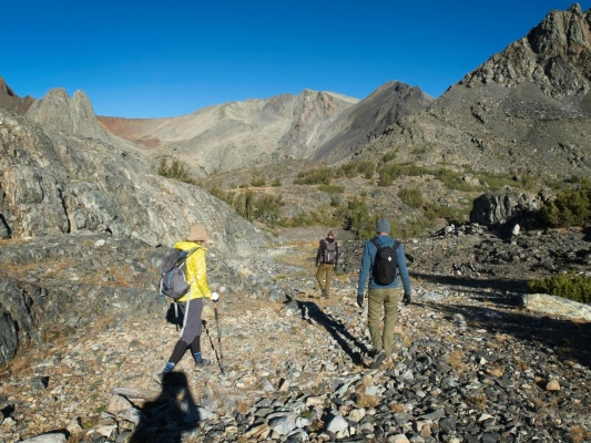 After several hours of mostly walking in the shade, we're treated to warm sunshine atop Virginia Pass. Twin Peaks is the prominent light grey massif in the center of the frame. virginia pass