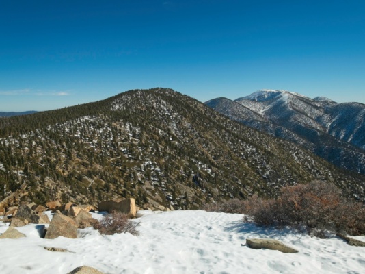 Looking over at Anderson Peak from East San Bernardino Peak with snowy San Gorgonio in the background anderson peak