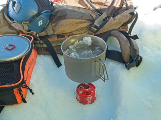 I pass the late afternoon hours by melting snow mount shasta camping
