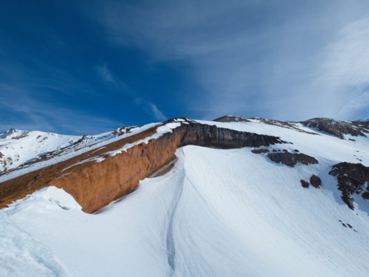 Colorful cliff bands above the Konwakiton Glacier mount shasta
