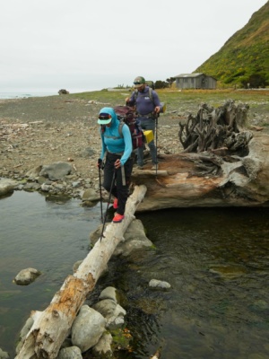 Kim and Alex cross Fourmile Creek lost coast trail