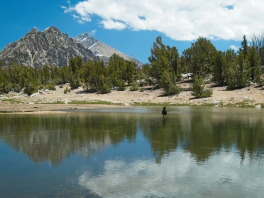 The trail junction is under a couple feet of water this year high sierra flooding