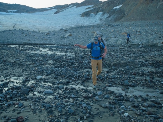 There's a lot of water from the melting glacier to step over glacial landscape