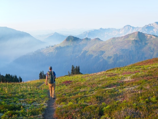 Craig B. walks down the trail en route to the trailhead glacier peak trail