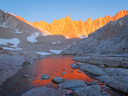 Minutes later, sunlight lights the peaks mount whitney trail