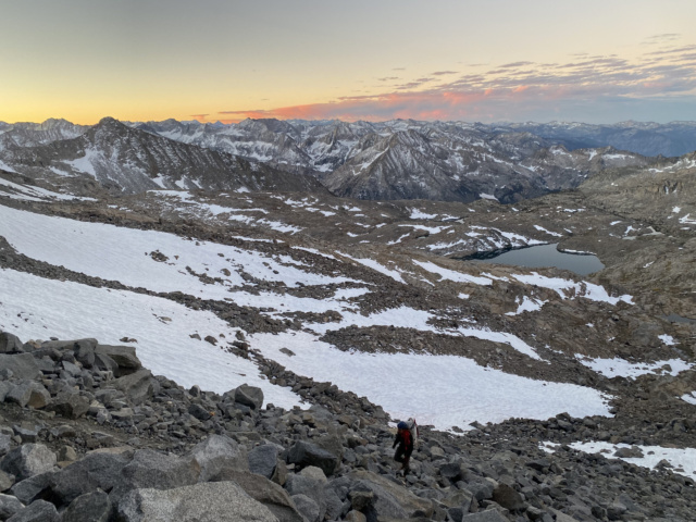 Yours truly trudges up the talus at sunrise - photo credit: Josh palisade traverse