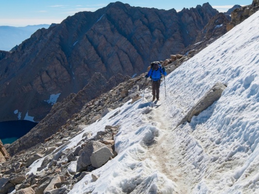 CK steps across the only snowfield on the trail mount whitney trail