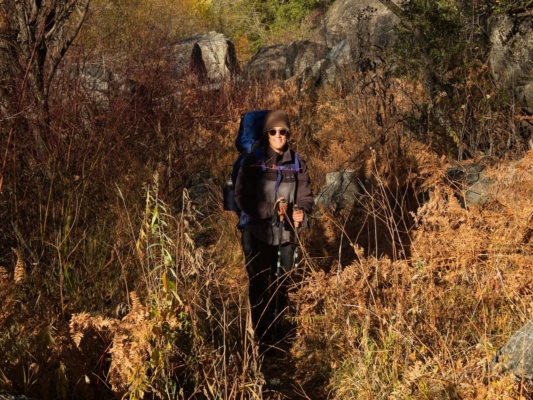 Kenza poses for a picture as we hike along Tiltill Valley backpacking