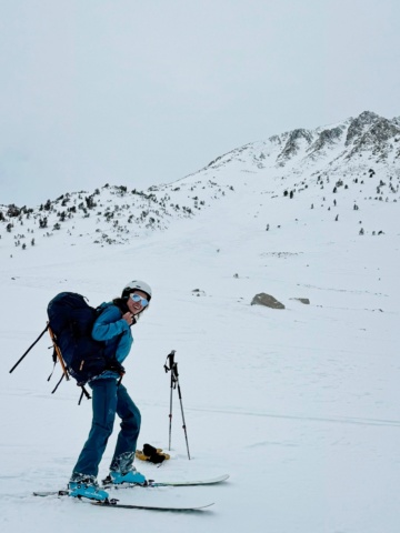 Maddie swaps out layers partway down the mountain birch mountain