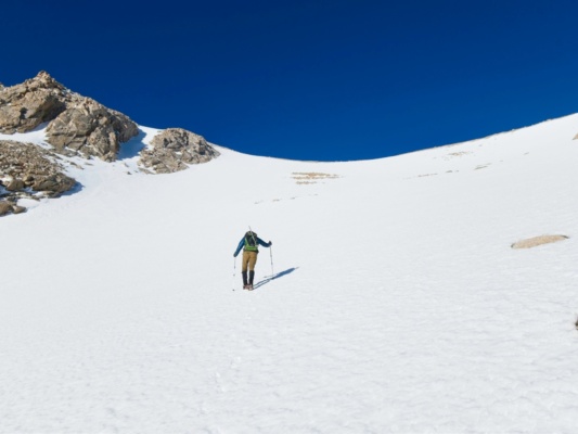Craig hikes up the snowy canyon mountaineering
