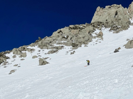 The chute widens further down the mountain ski tour