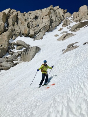 I rendezvous with Andrew partway down the chute ski tour