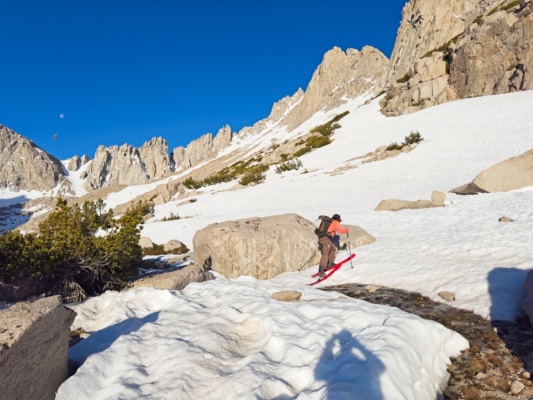We see a high, traversing line of snow that will get us to the couloir ski tour