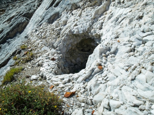 An enormous vein of calcite crystals with a small, water-filled cavern calcite