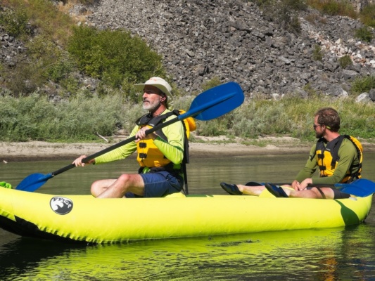 Steve and Brian relaxing in a two-person kayak main salmon river rafting