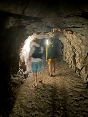 Mason and Brian walk through the tunnel main salmon river rafting