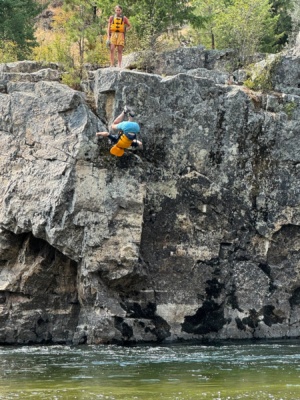 Isaac does a flip into the river main salmon river rafting