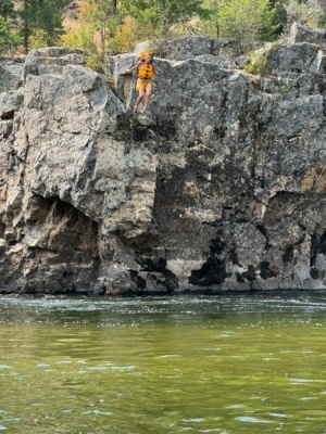 Olivia cliff jumping into the Salmon River main salmon river rafting