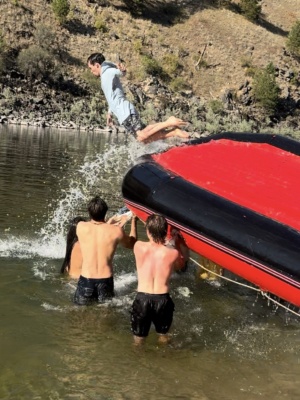 Yours truly flies off the end of a raft slip-n-slide main salmon river rafting